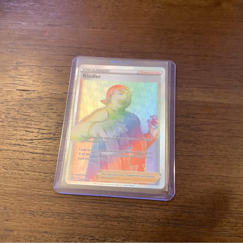 Pokemon Holographic Trainer Card with Orange and Green